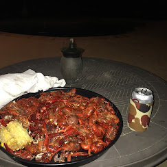 Family-style seafood plates at B&D